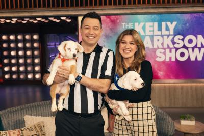 Hannibal's puppies at the Puppy Bowl, one being held by Kelly Clarkson