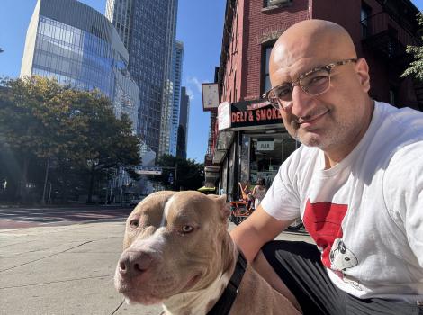 Mo outside with Cadbury the dog