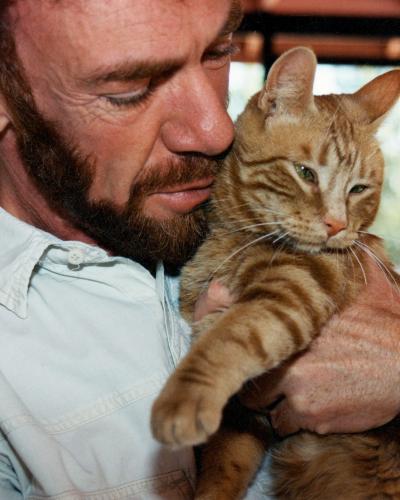 Michael Mountain holding Julius the cat
