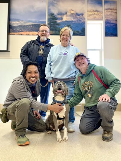 Big smiles all around as Jessa gets ready to head home. With her are (clockwise from Jessa) caregiver Al Sawadan, adopters John and Teri Crema, and caregiver Tom Williams.