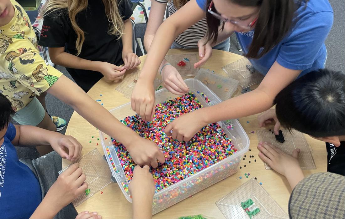 Students creating items to be sold at the school's market to benefit Best Friends