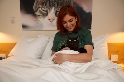 Samantha and Licorice in bed during the sleepover
