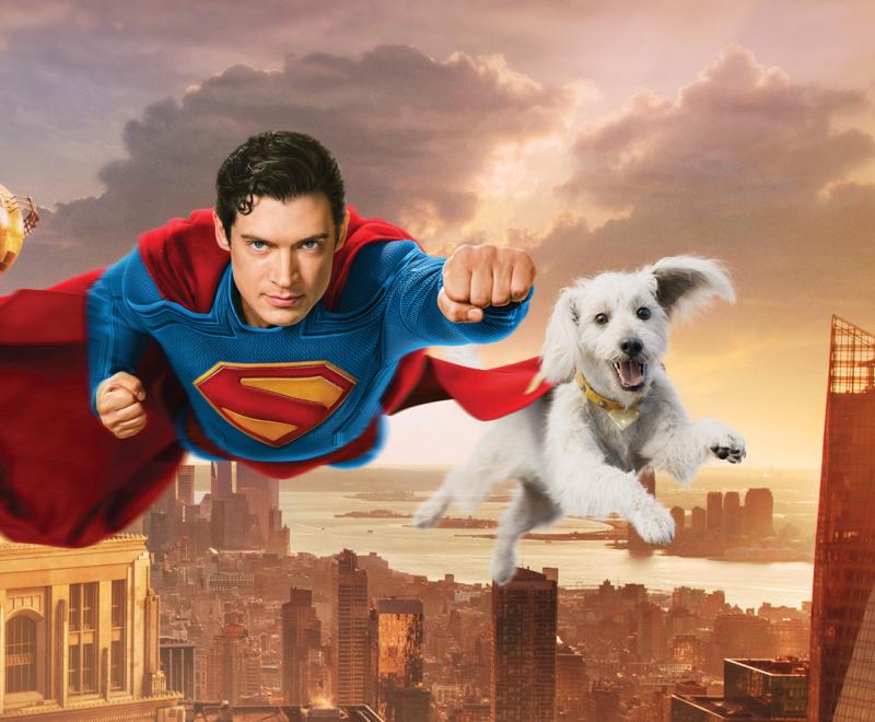 Superman flying next to Krypto the dog